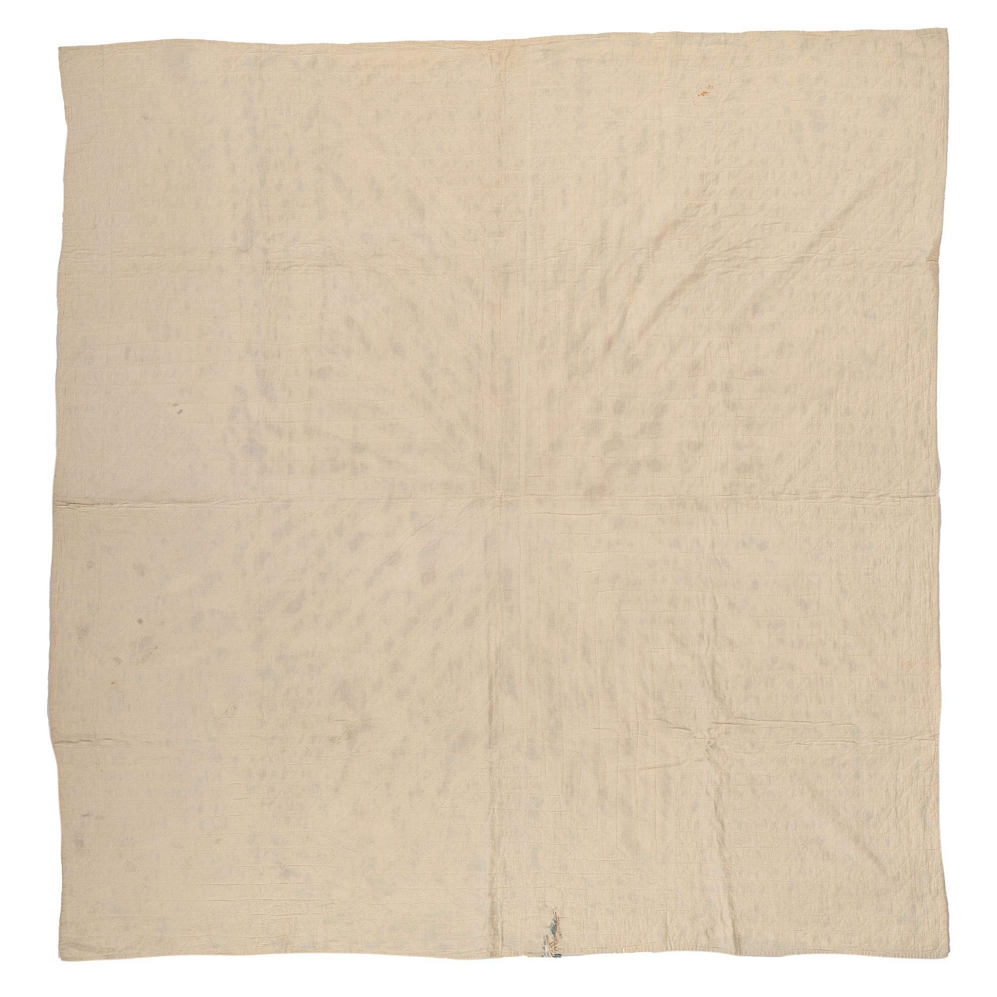 A Star Patterned Pieced Quilt