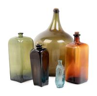 A Group of Colored Glass Bottles
