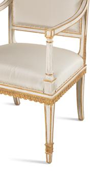 A Pair of Painted and Parcel Gilt Armchairs