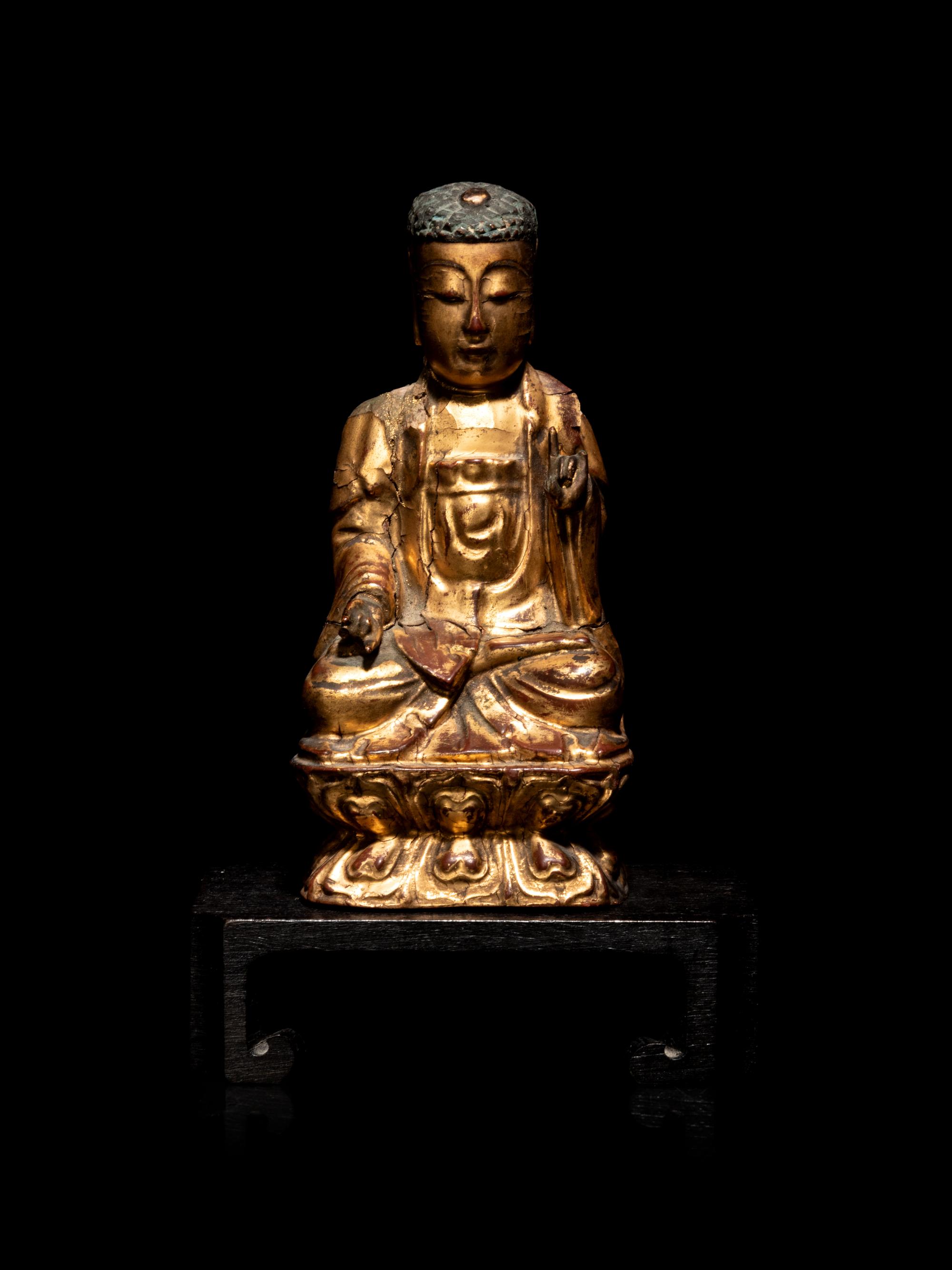 A Small Chinese Gilt Lacquered Wood Figure of Buddha Shakyamuni