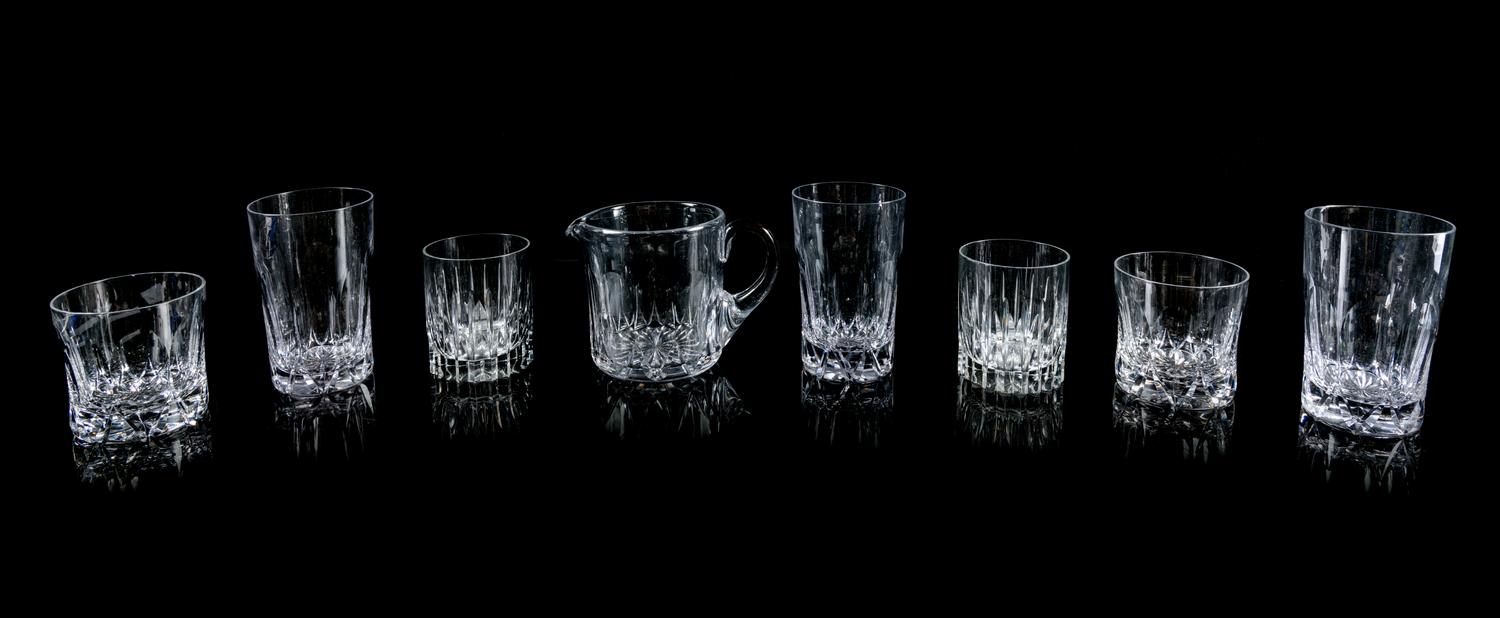 A Group of Thirty-Three English Cut Glass Drinking Articles — TUDOR, 20TH CENTURY