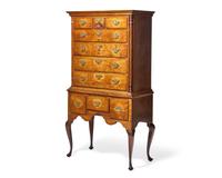 A Queen Anne Carved Figured Maple and Birch Flat-Top High Chest of Drawers