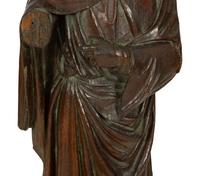 A Continental Carved Oak Figure of a Saint