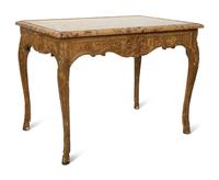 A Louis XV Giltwood Marble Top Side Table — CIRCA 1725