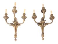 A Pair of Louis XVI Style Gilt Bronze Three-light Wall Sconces Height 19 x width 16 inches. — 19TH CENTURY