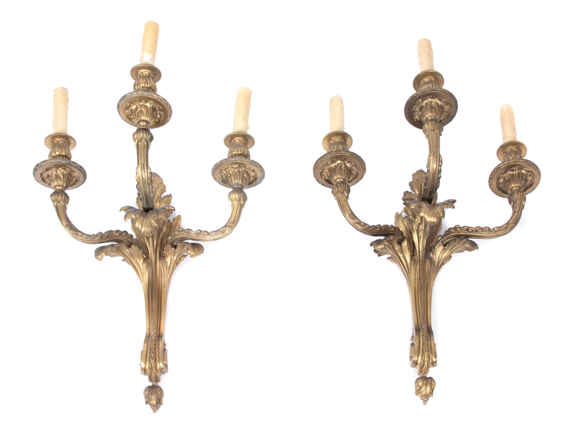 A Pair of Louis XVI Style Gilt Bronze Three-light Wall Sconces Height 19 x width 16 inches. — 19TH CENTURY