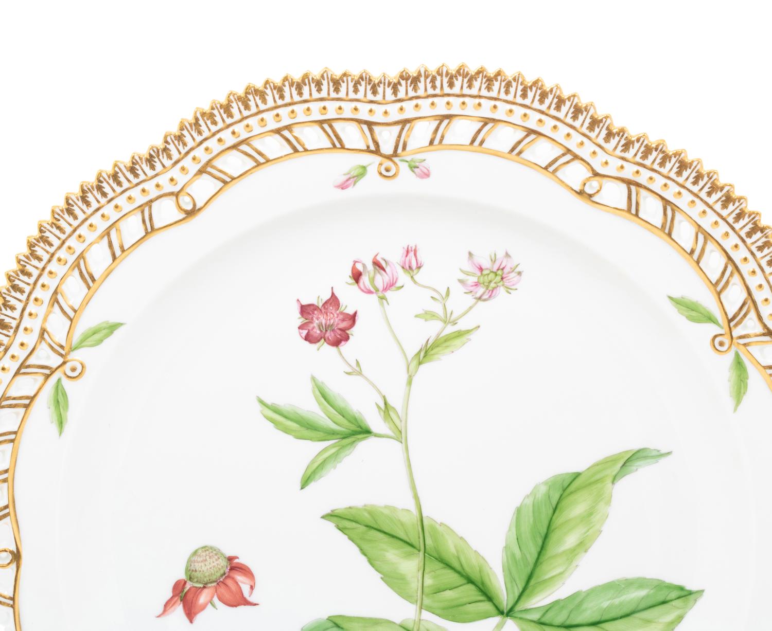 A Set of Fourteen Royal Copenhagen Flora Danica Dinner Plates