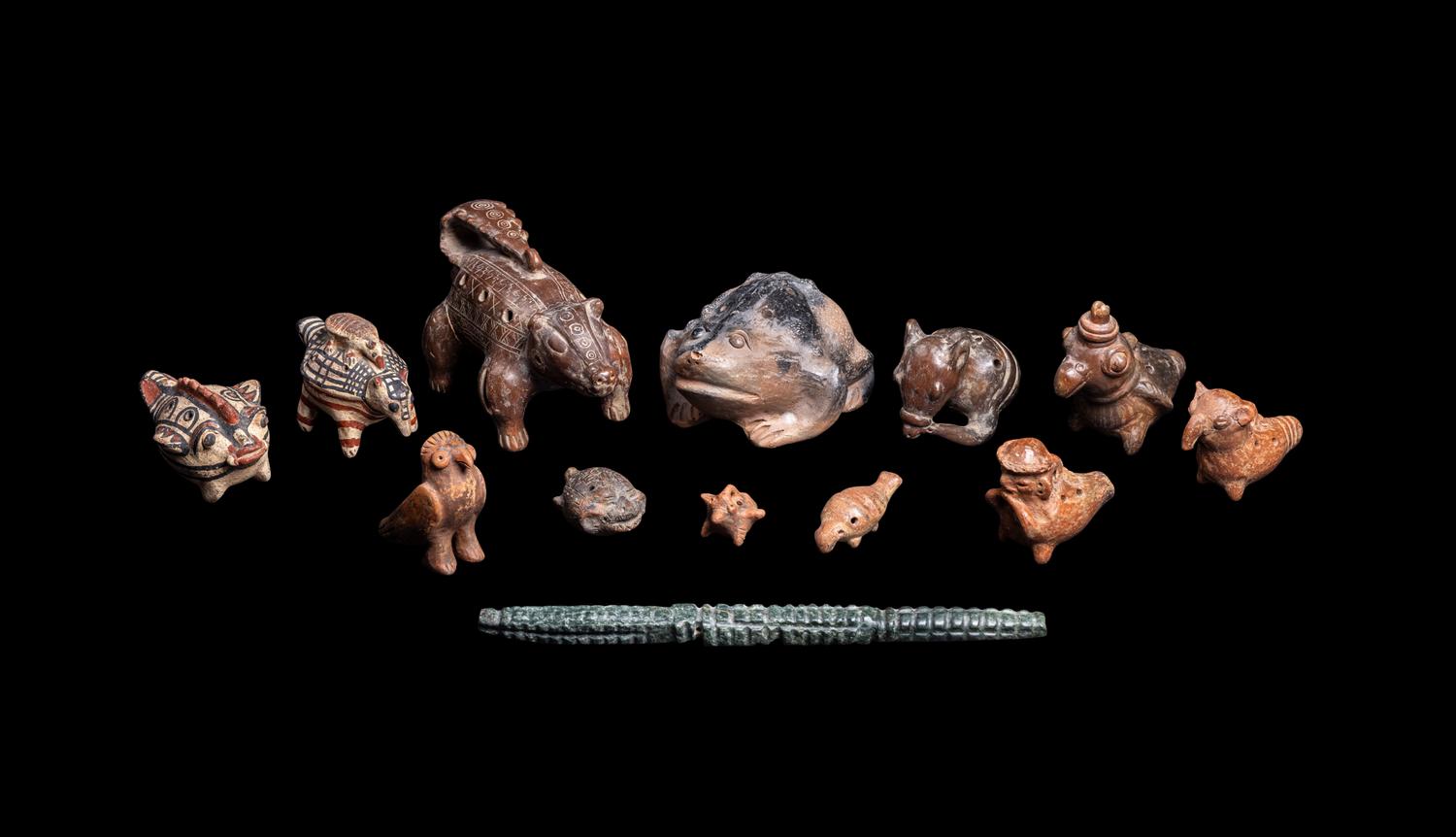 Thirteen Costa Rican and Panamanian Ocharinas (Whistles) and One Stone Instrument