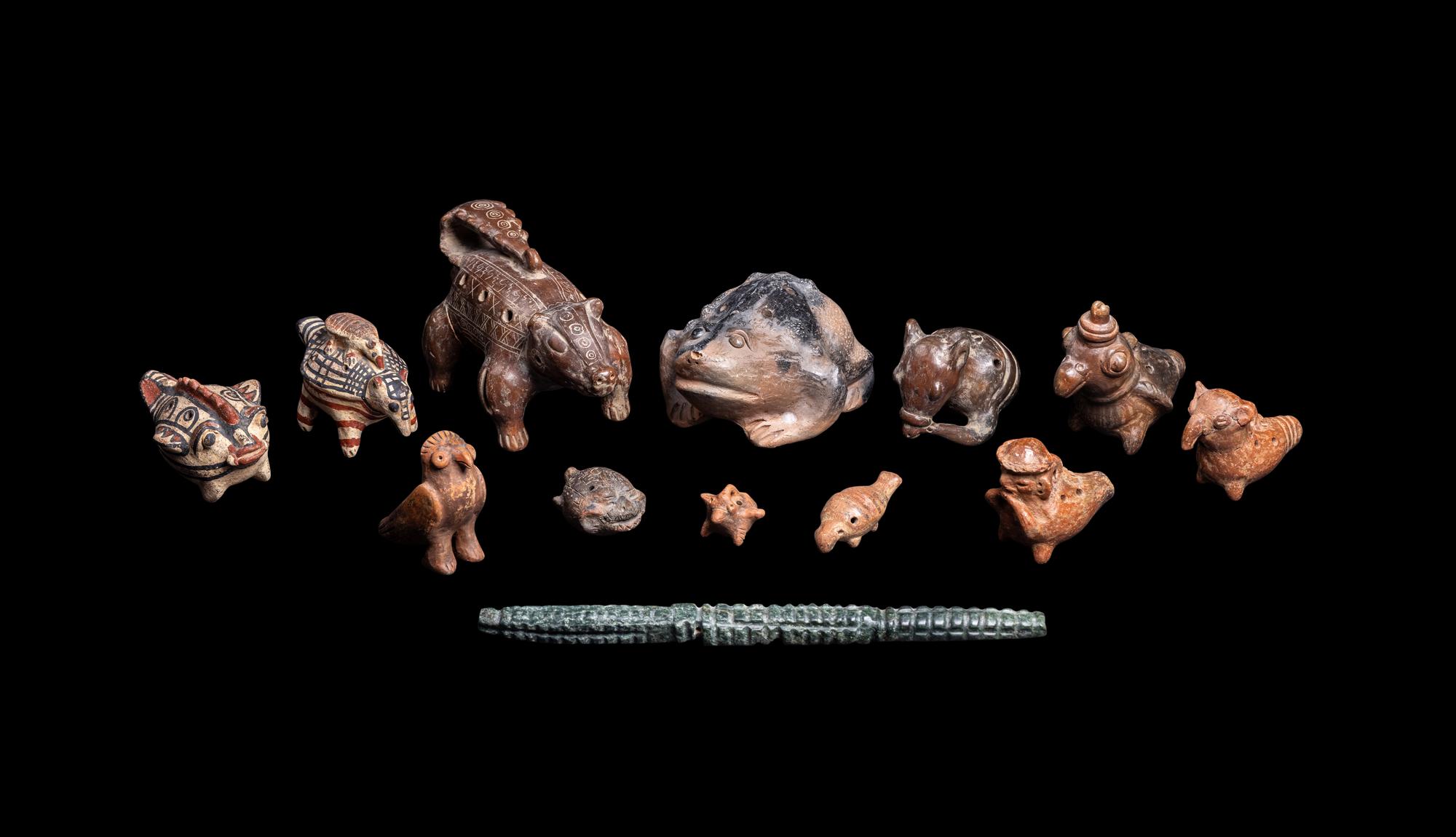 Thirteen Costa Rican and Panamanian Ocharinas (Whistles) and One Stone Instrument