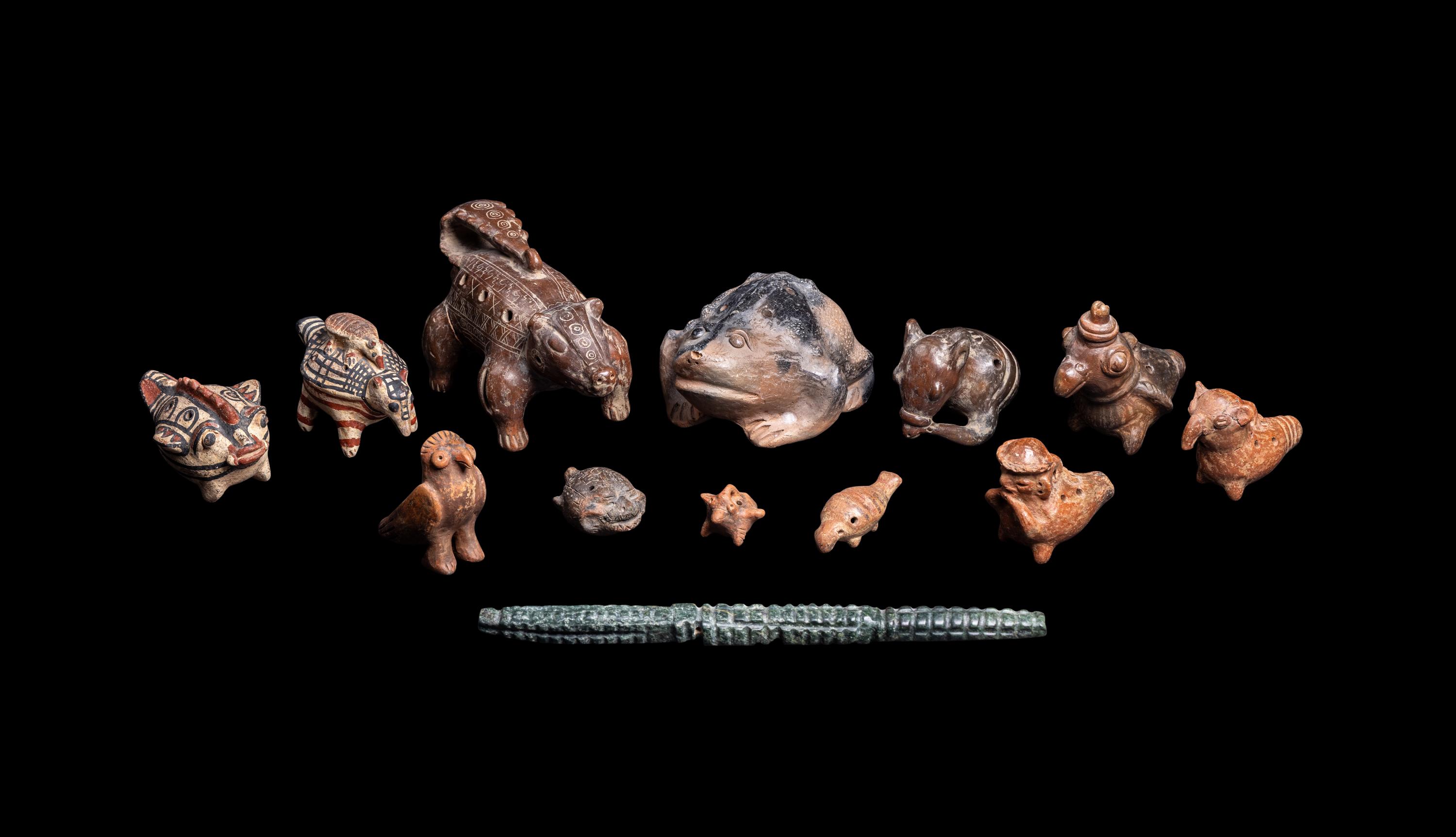 Thirteen Costa Rican and Panamanian Ocharinas (Whistles) and One Stone Instrument