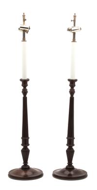 A Pair of English Mahogany Columnar-Form Candlesticks Height overall 34 inches. — 20TH CENTURY