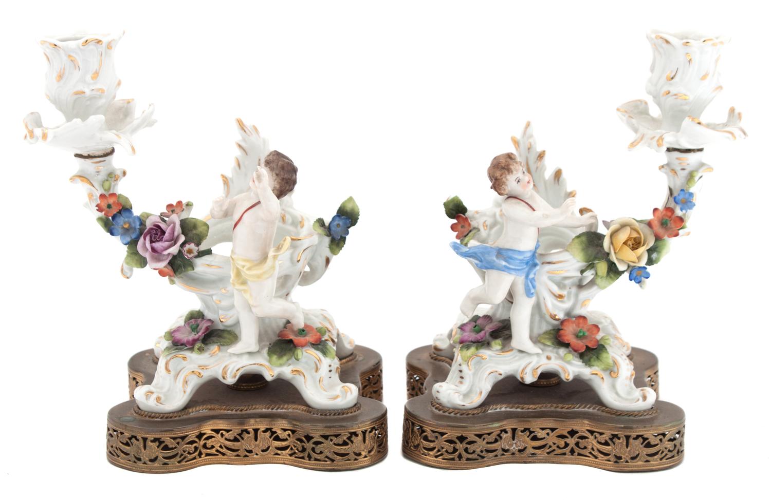 A Pair of Meissen Porcelain Candlesticks Height 8 inches.