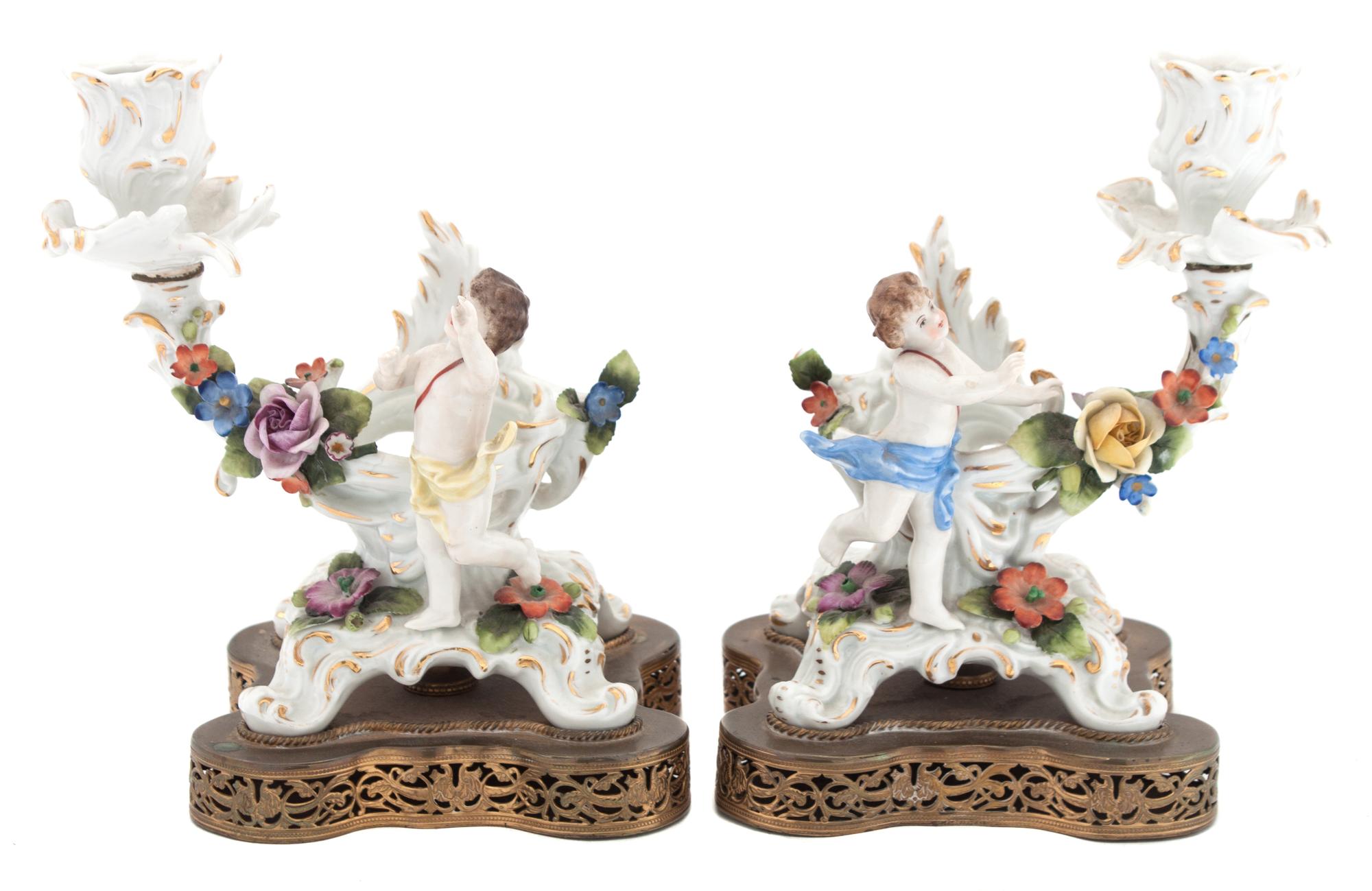 A Pair of Meissen Porcelain Candlesticks Height 8 inches.
