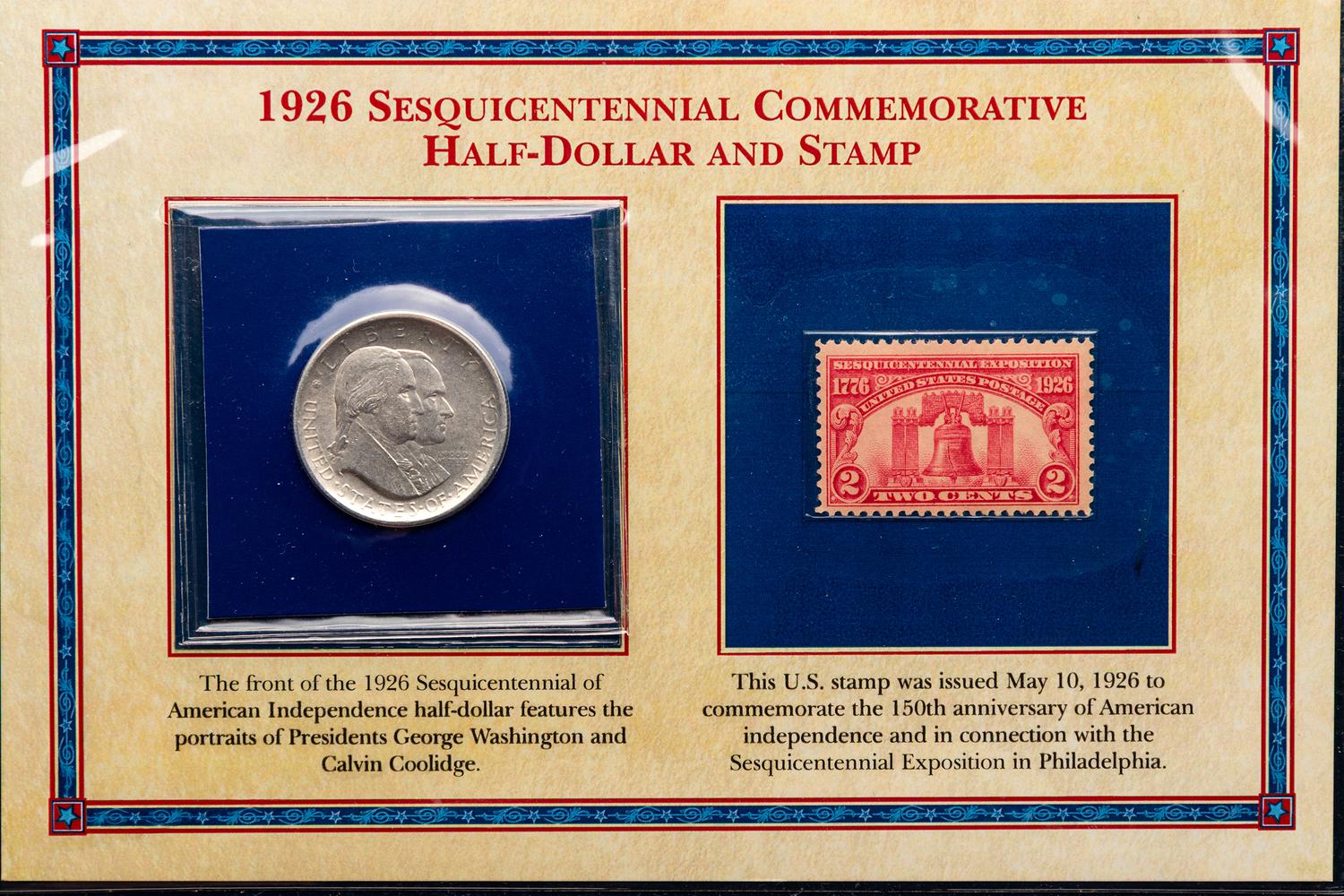 A Group of Four Commemorative 50c Coin and Stamp Sets