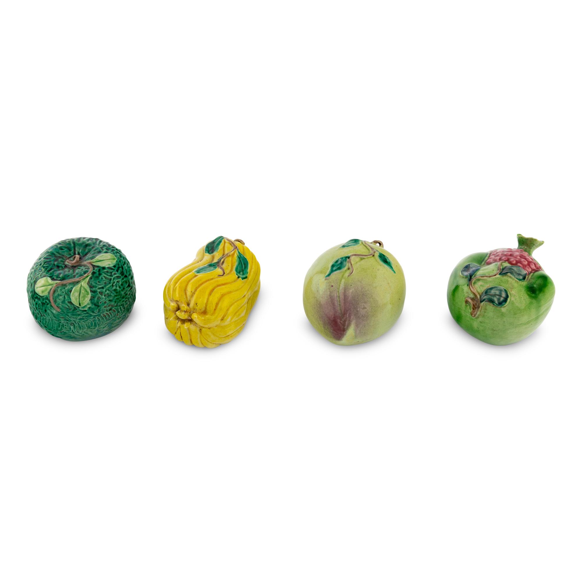 A Set of Four Chinese Glazed Terracotta Fruits
