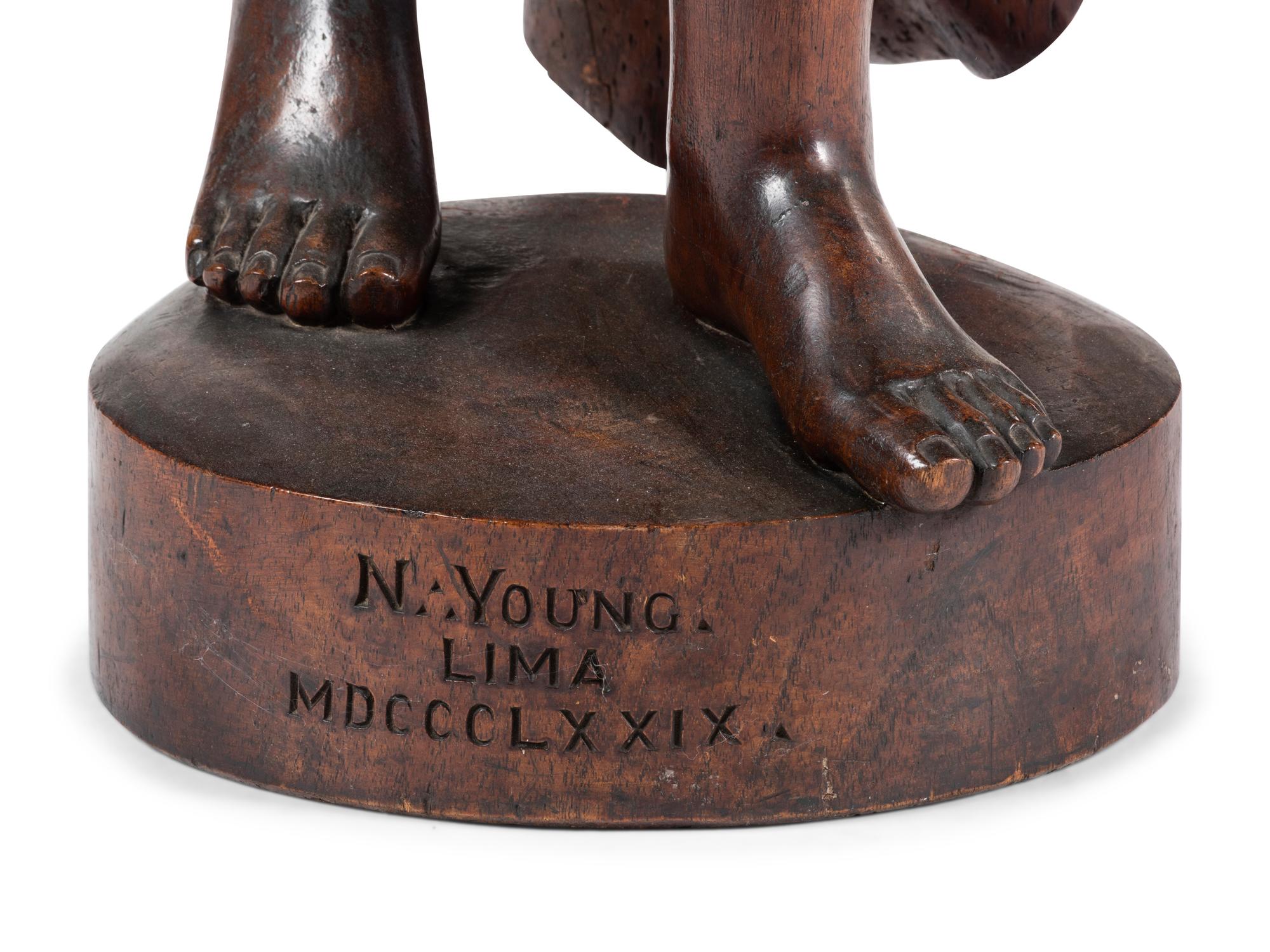 A Carved Walnut Figure of Angel Gabriel