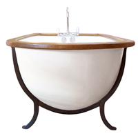 A Zinc and Wood Bathtub 60" W x 28" D x 31" H, 21" H to top of tub — United States, Early 20th Century
