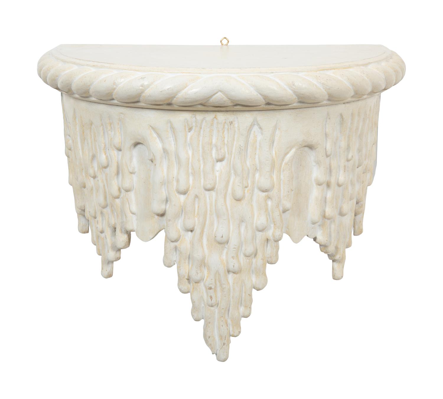 A Pair of White Painted Grotto Style Wall Brackets