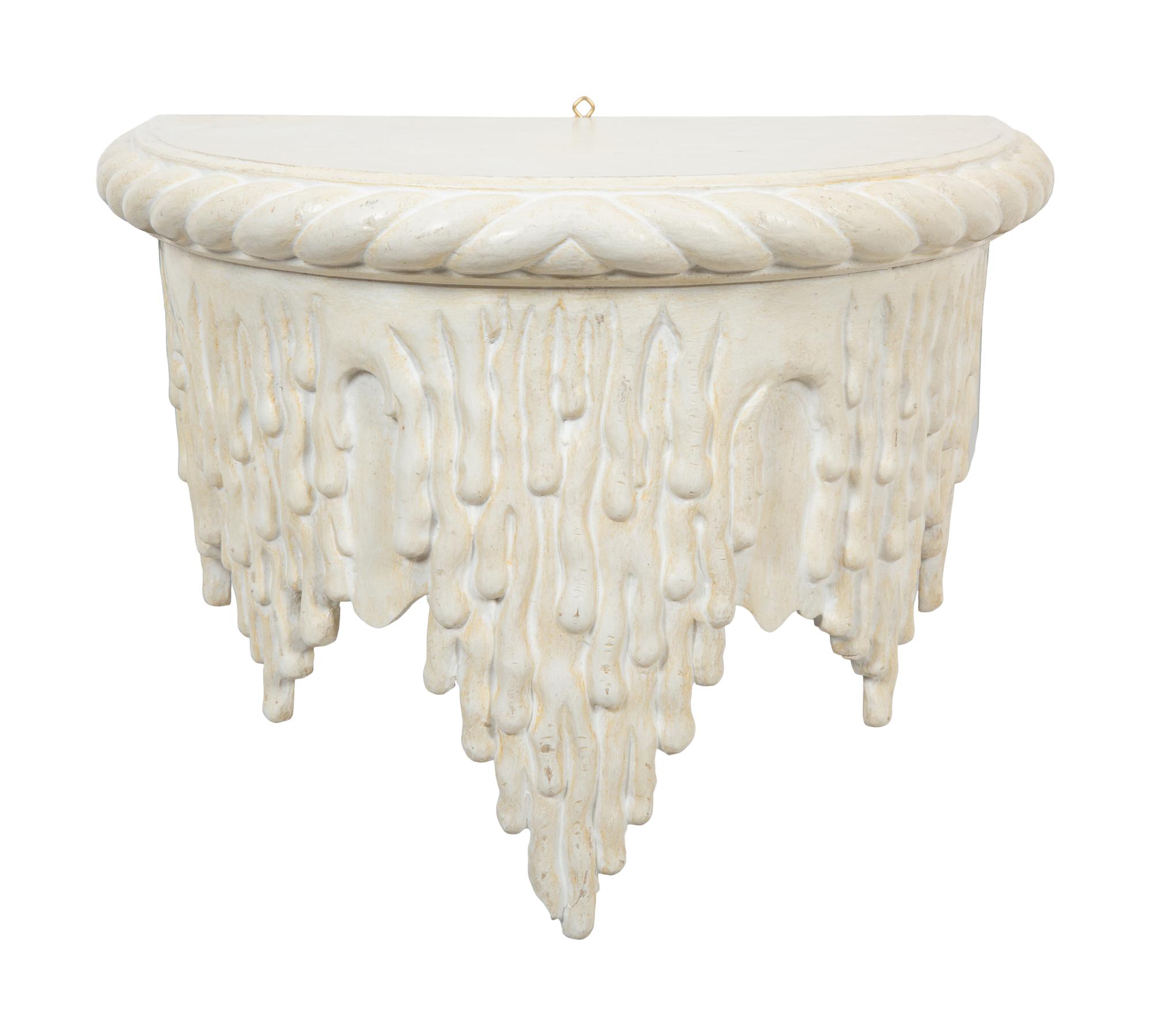 A Pair of White Painted Grotto Style Wall Brackets