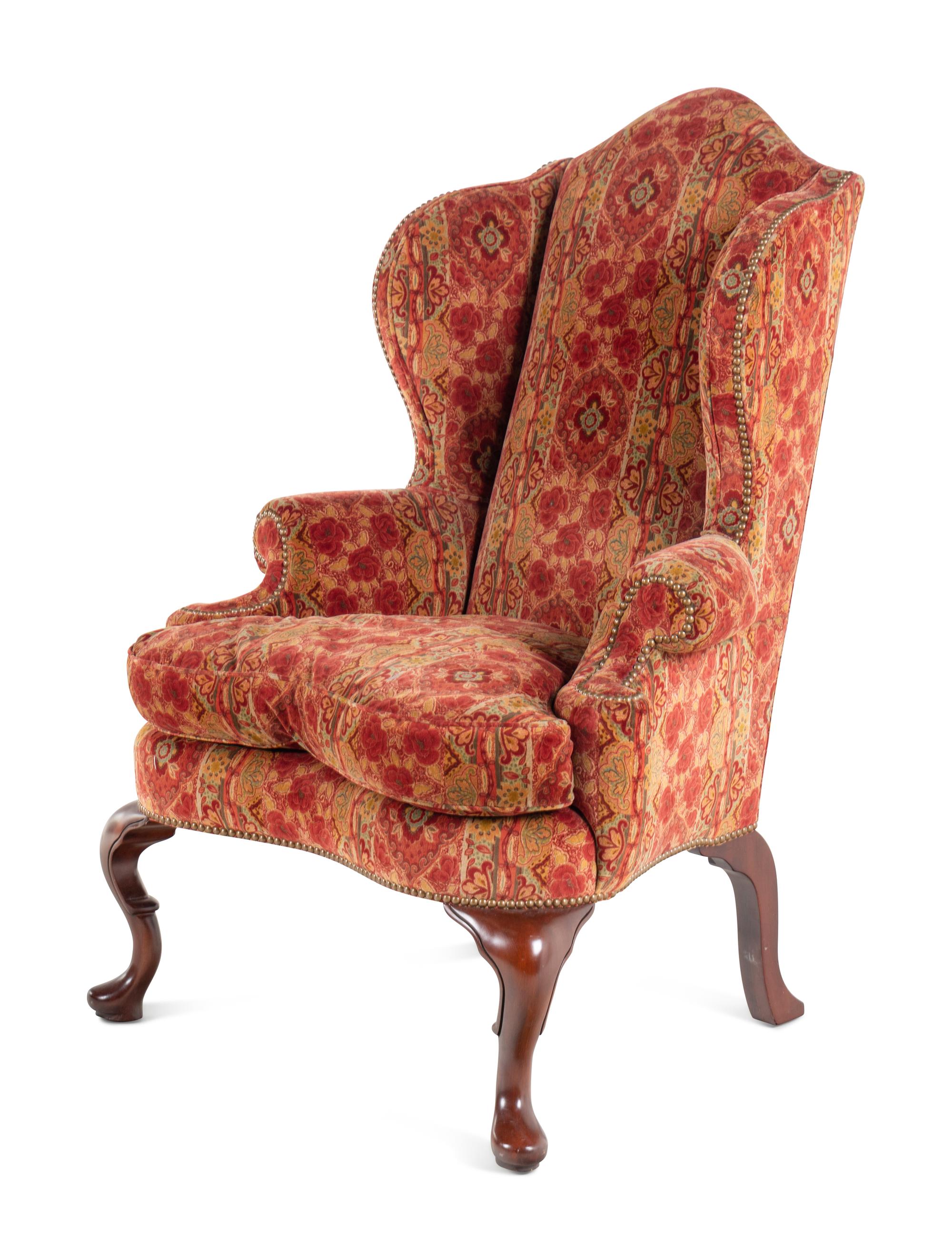 A Pair of Queen Anne Style Upholstered Library Chairs