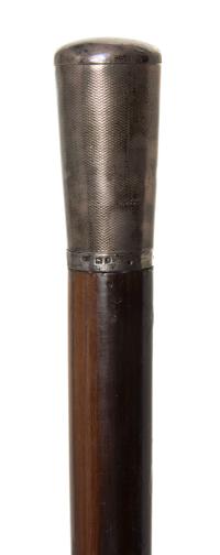 An English Tipping Handled Walking Stick, Length of handle 2 1/2 x length overall 36 1/2 inches.
