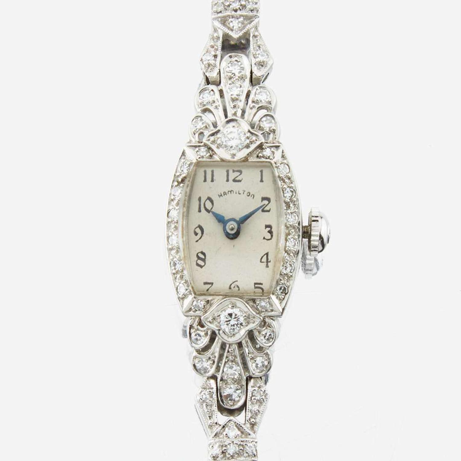 A lady's platinum and white gold diamond bracelet watch, Hamilton