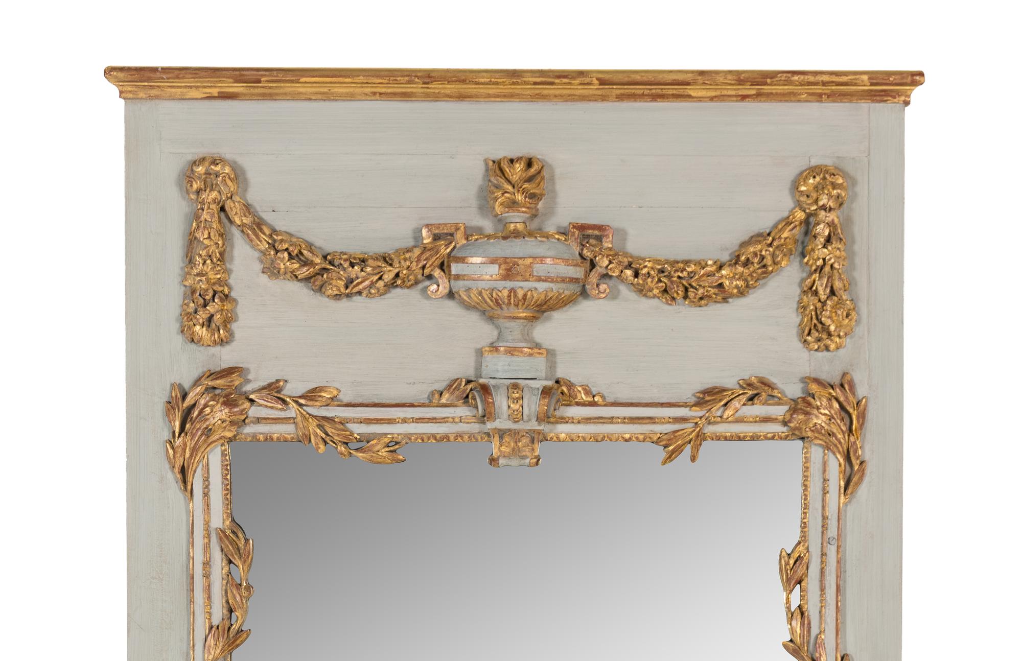 A Louis XVI Style Painted and Parcel Gilt Mirror