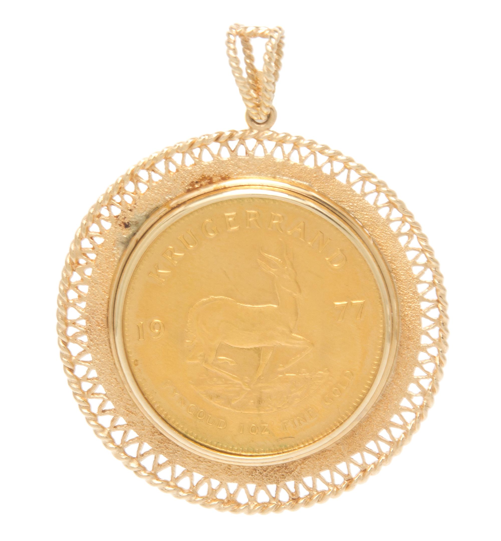A 14 Karat Yellow Gold and South African Krugerrand Gold Coin Pendant, 29.20 dwts.