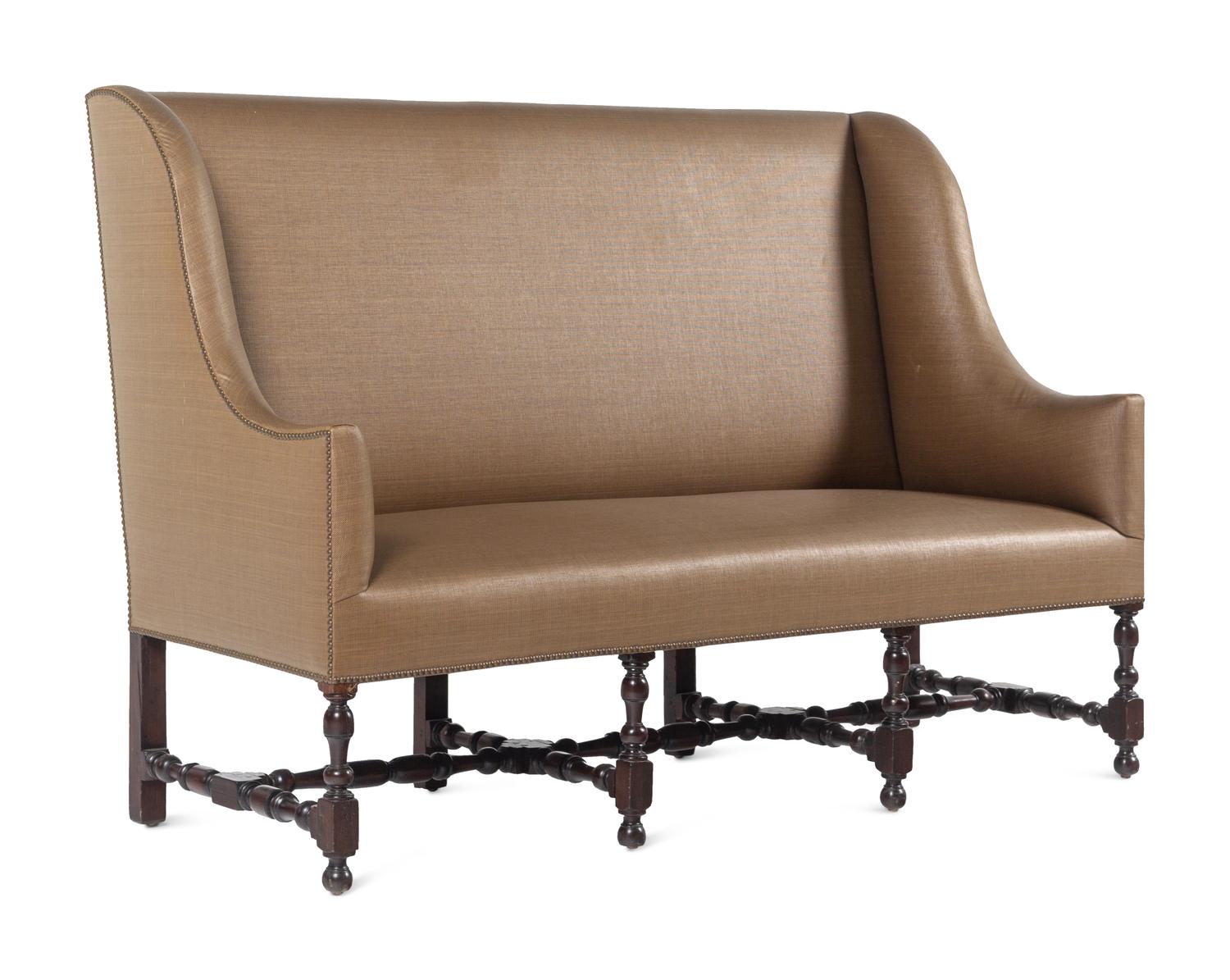 A French Walnut Wingback Sofa