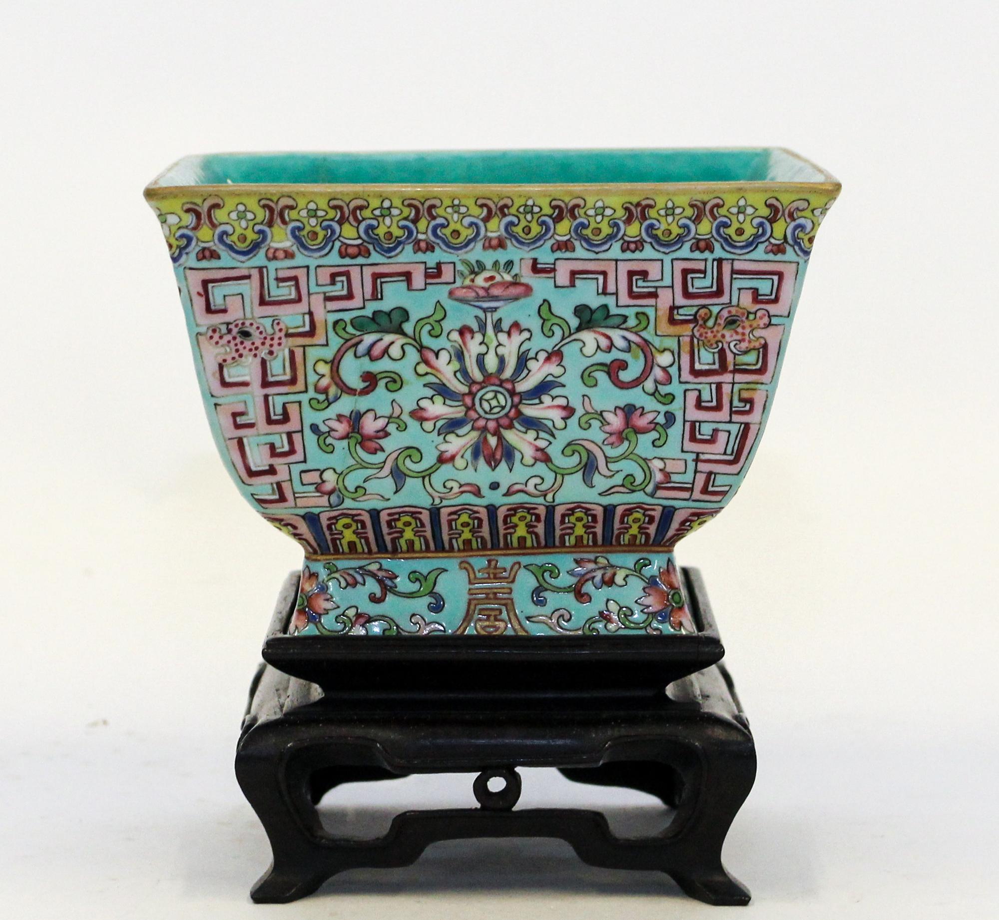 A Famille Rose Porcelain Square Bowl Height 3 1/2 inches.