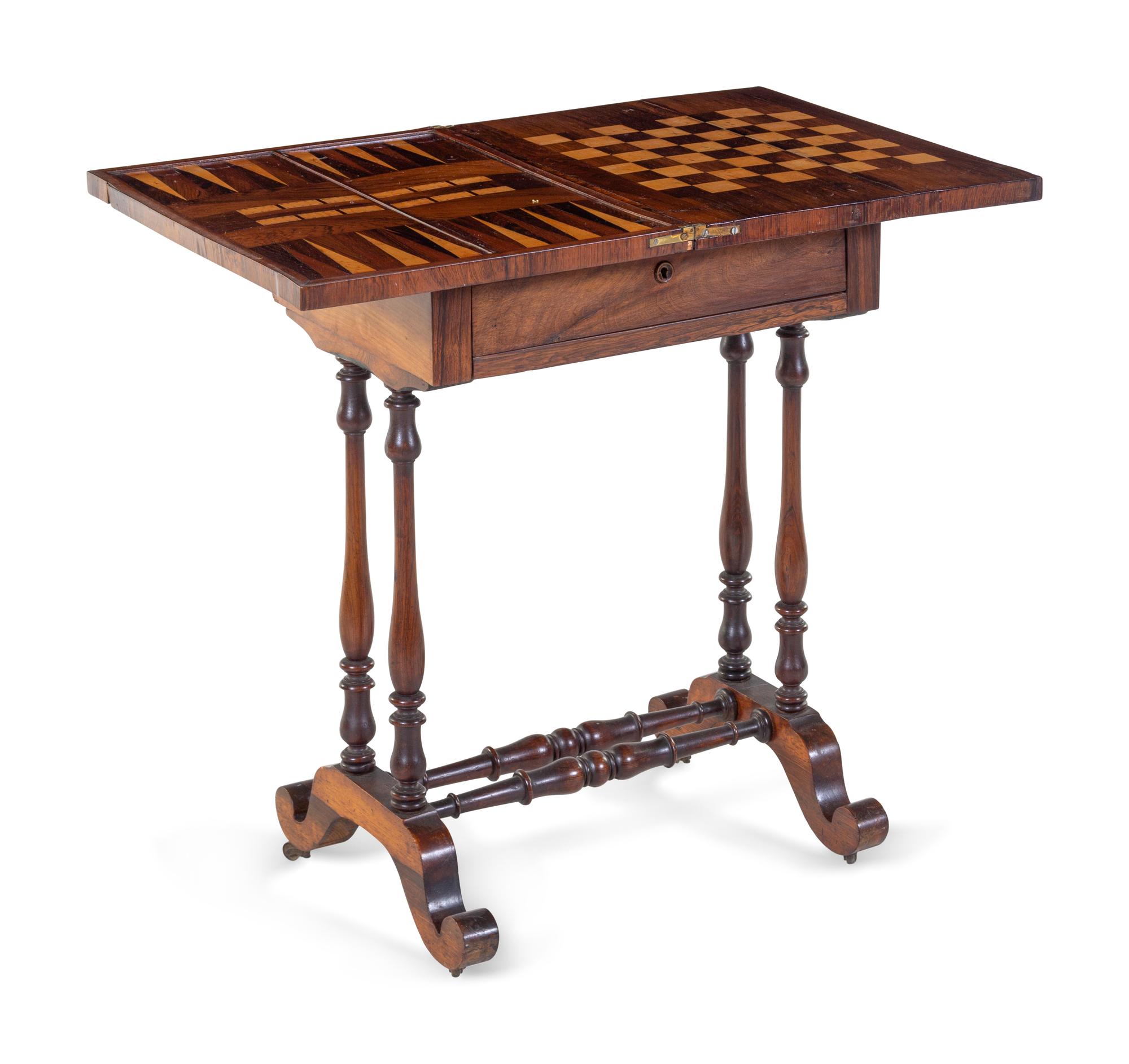 A Late Regency Walnut Game Table