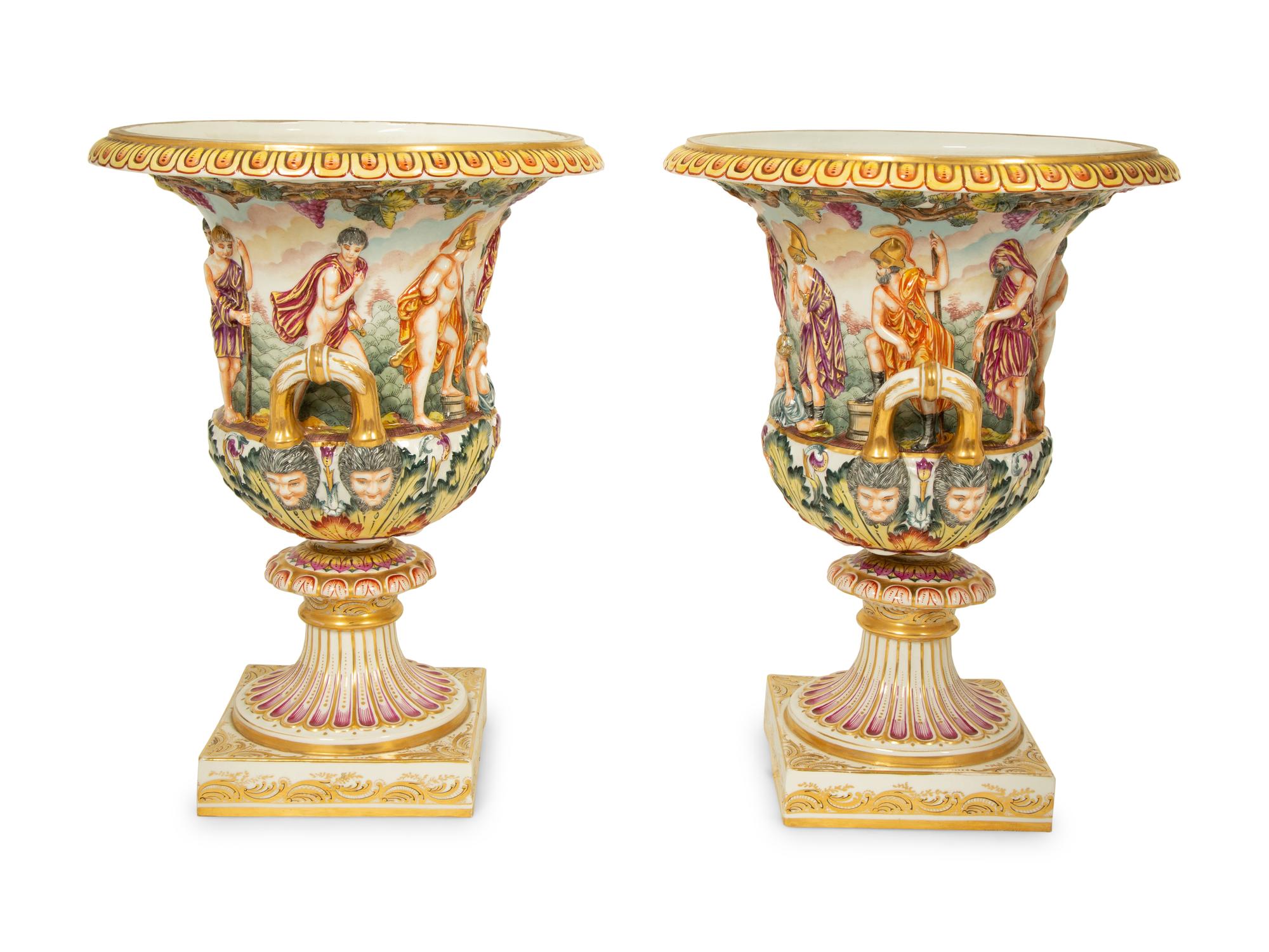 A Pair of Capodimonti Campana-Form Relief Molded Urns — 19TH CENTURY