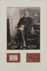 ADAMS, John Quincy, President (1767-1848). A lock of hair, originally folded into a sheet of paper (present here).