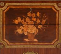 A Louis XV/XVI Transitional Style Gilt Metal Mounted Marquetry Marble-Top Commode