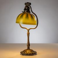 Tiffany Studios New York (American, 1880–1930) — Harp Table Lamp with Damascene Favrile shade, c. 1910