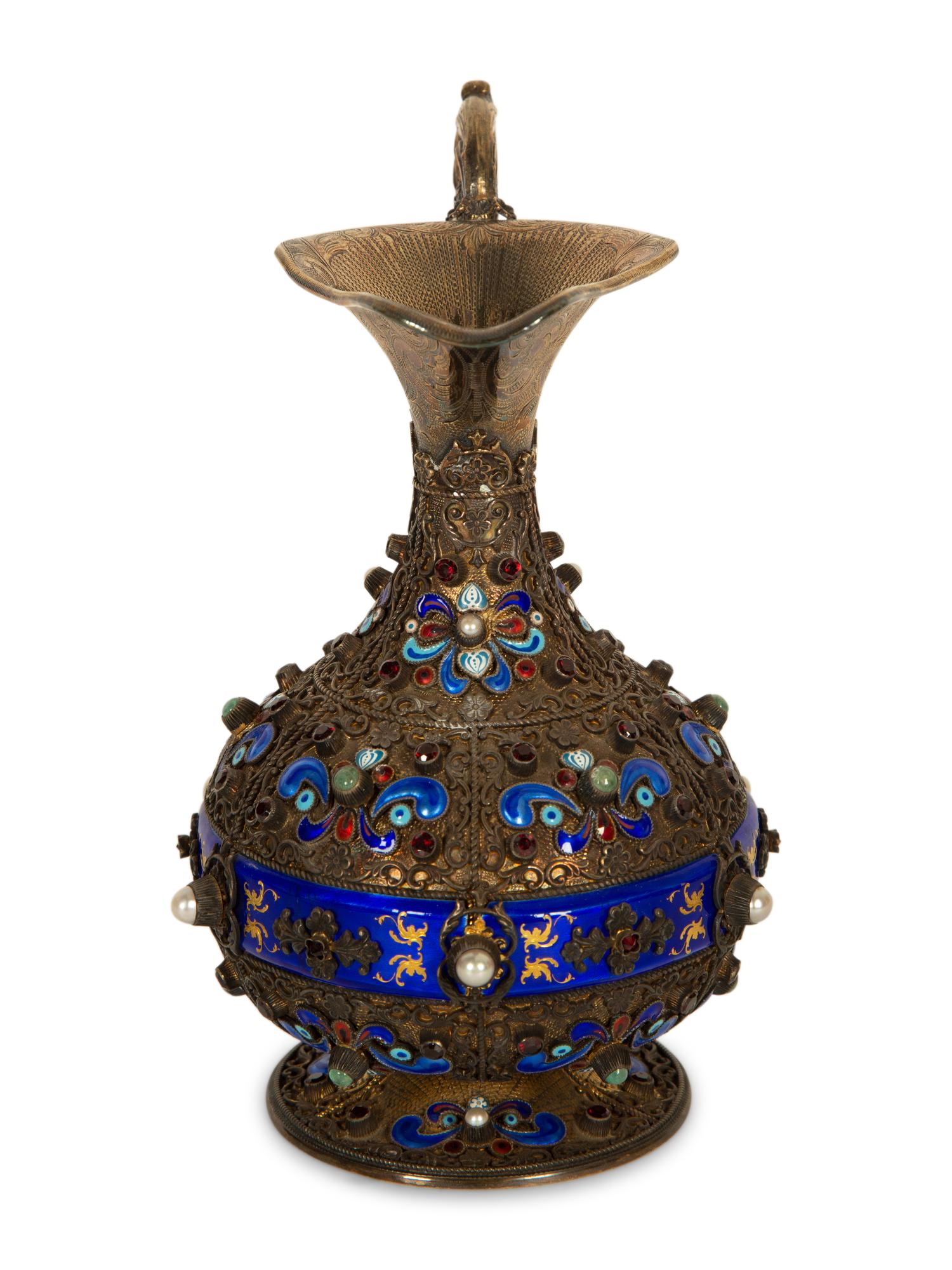 A Continental Enameled and Gem-Encrusted Silver-Gilt Wine Ewer