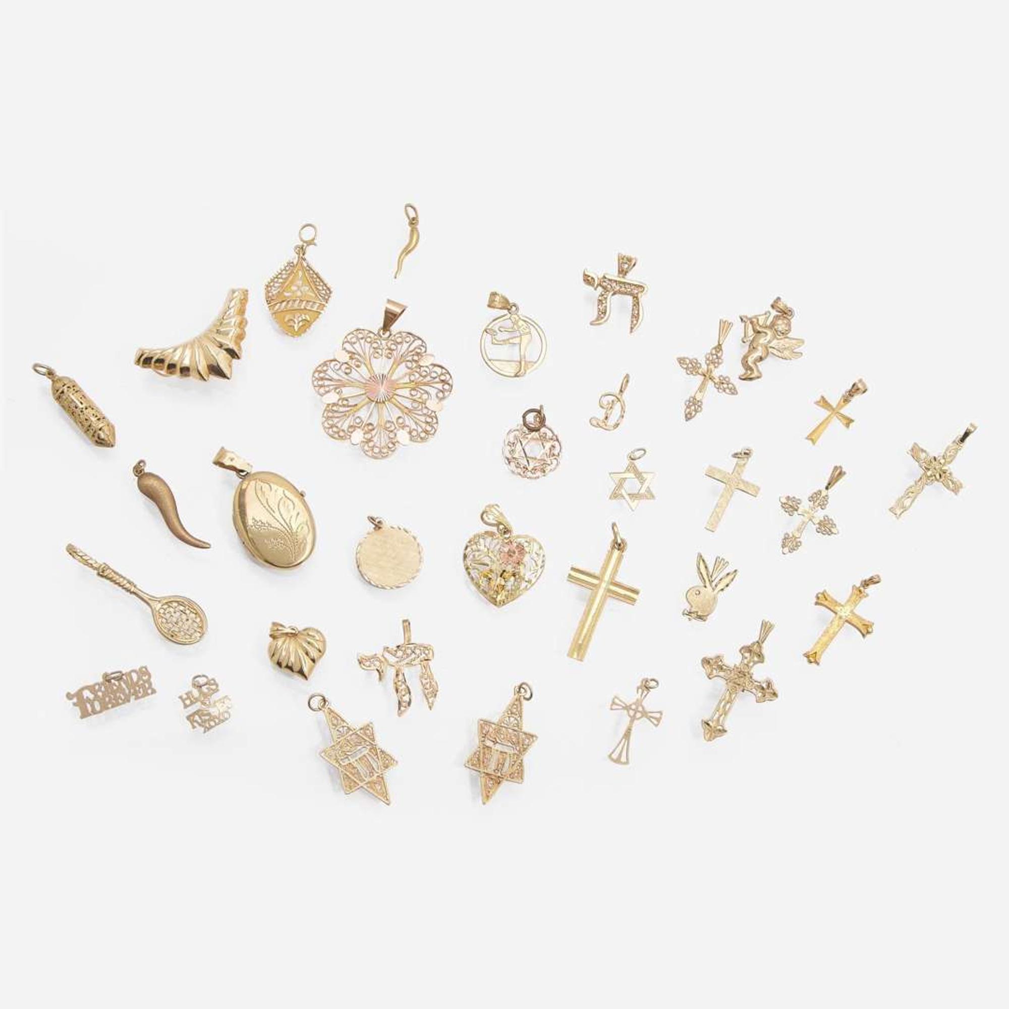 A Collection of 14K Gold Pendants