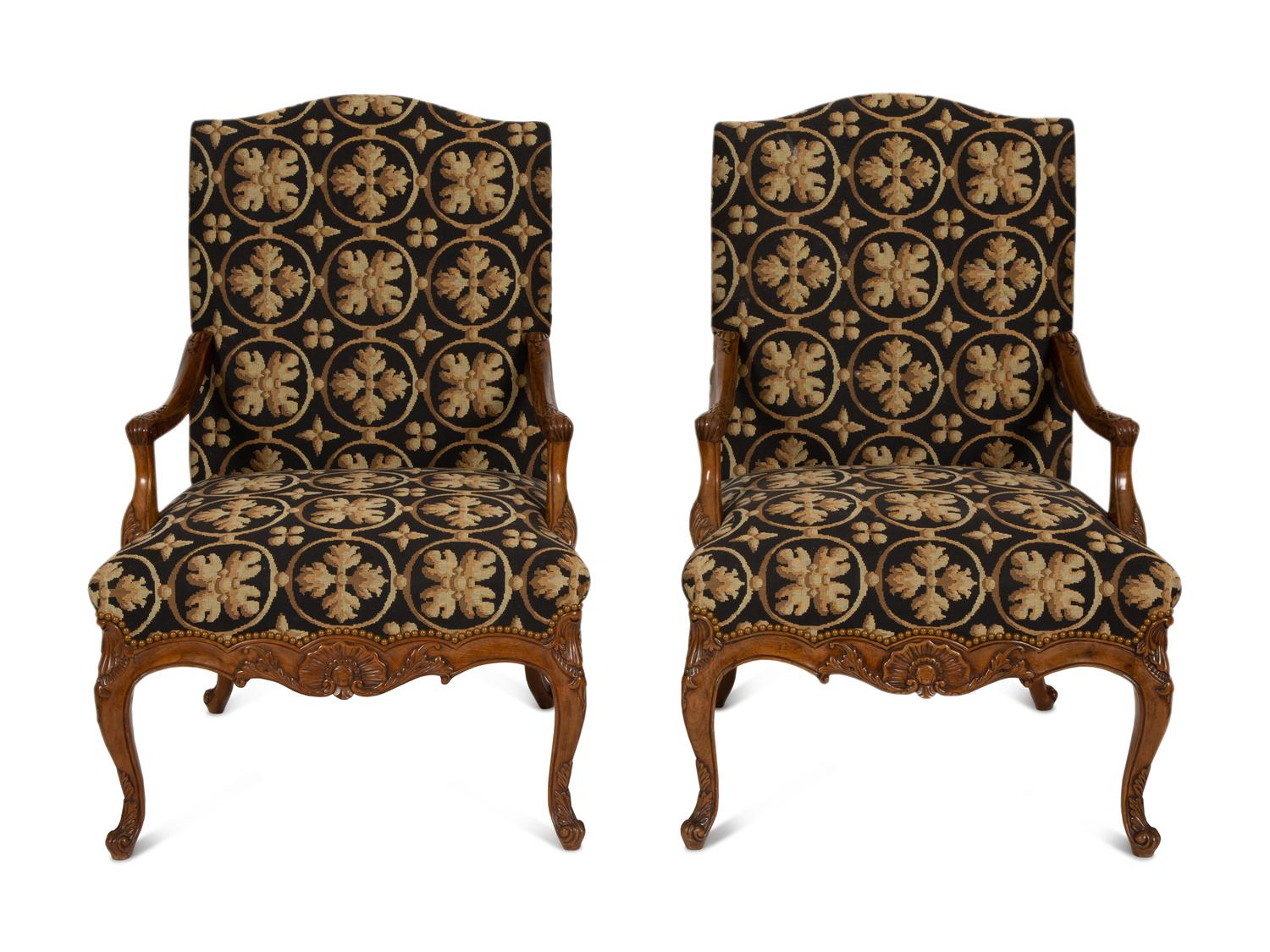 A Pair of Régence Style Upholstered Fauteuils