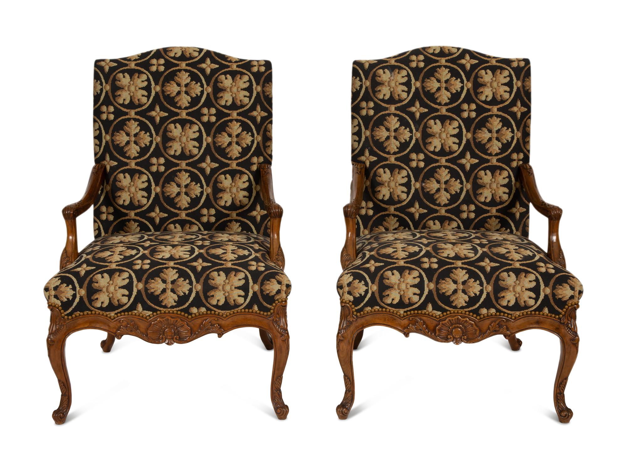 A Pair of Régence Style Upholstered Fauteuils