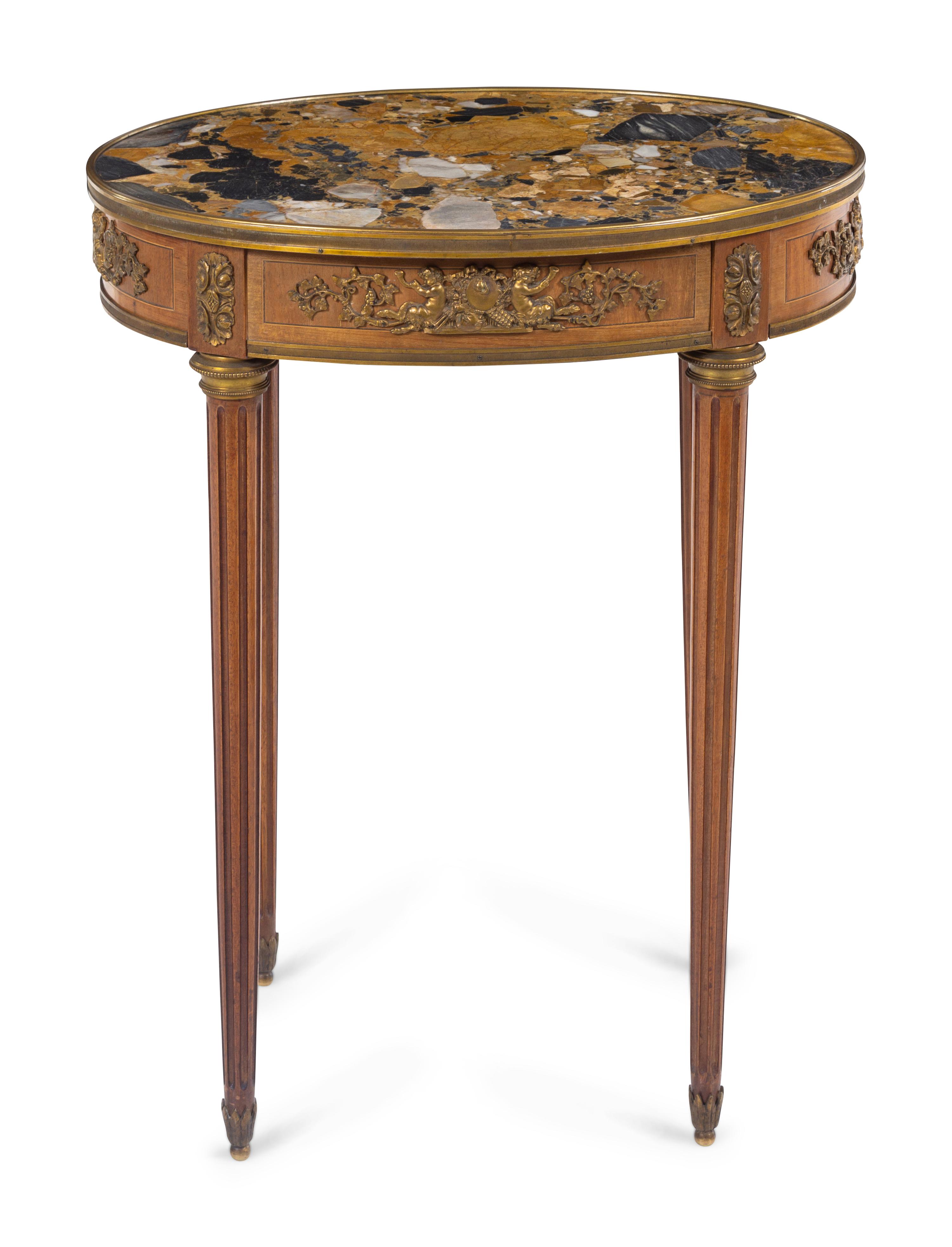 A Louis XVI Style Gilt Metal Mounted Side Table