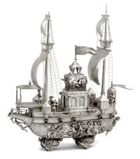 A Continental Silvered Metal Nef Height 21 1/4 x width 19 x depth 6 1/4 inches.