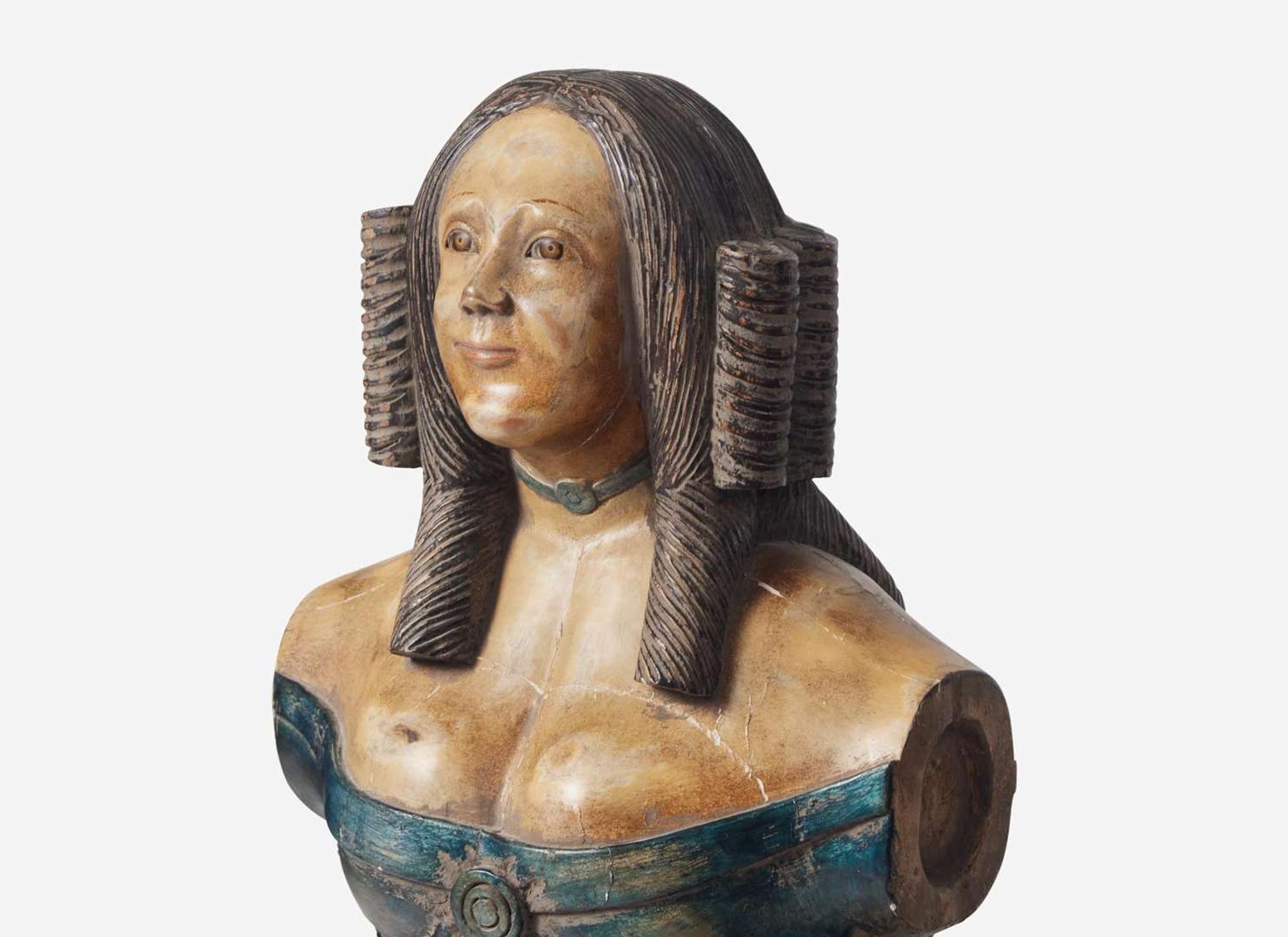 A carved and painted trade figure of a lady, likely 20th century