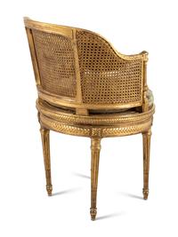 A Louis XVI Style Giltwood Bureau Bergère