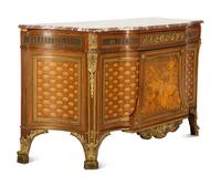 A Louis XVI Style Gilt Bronze Mounted Kingwood and Marquetry Marble-Top Commode