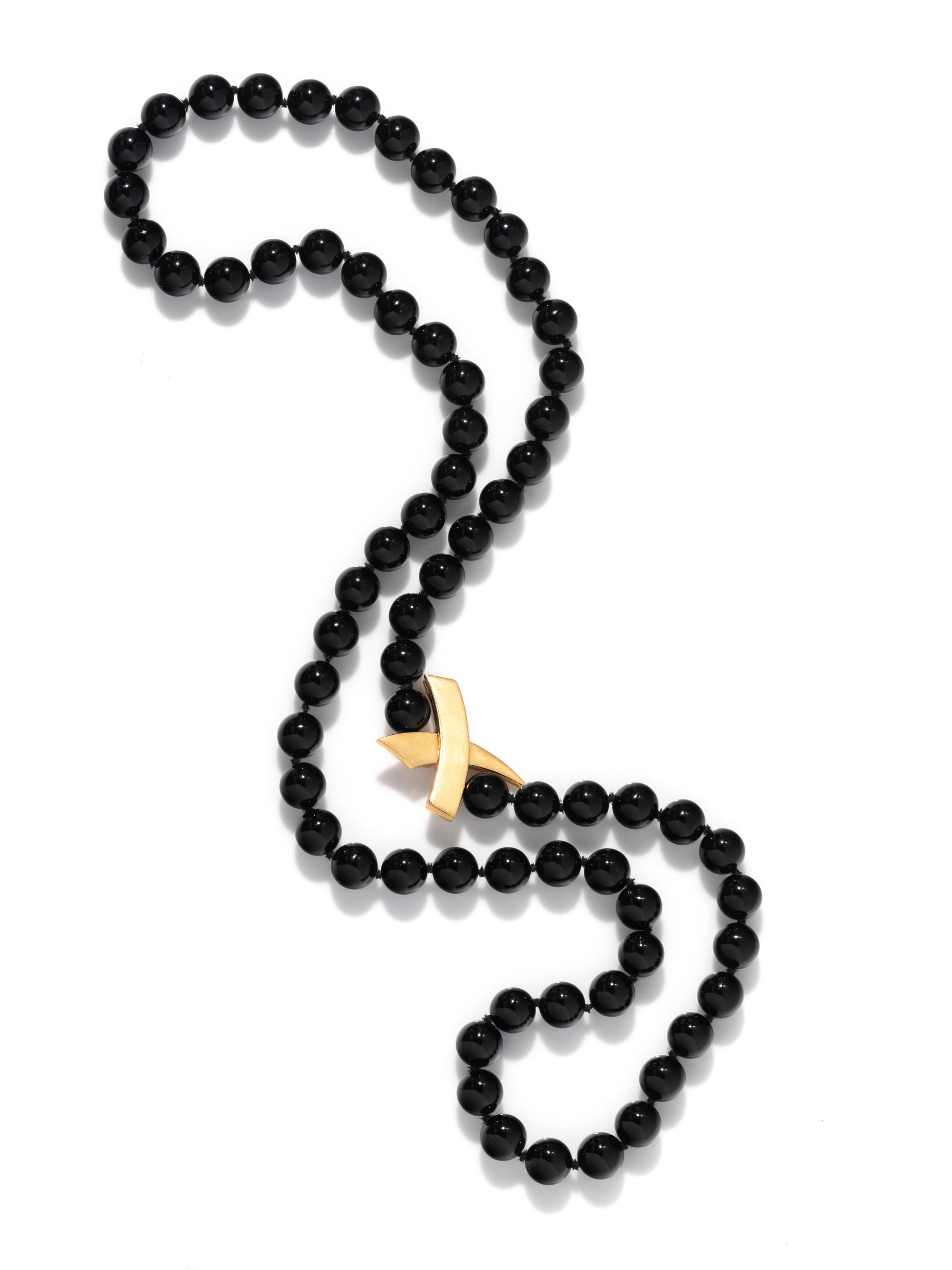 TIFFANY & CO., PALOMA PICASSO, FRENCH, YELLOW GOLD AND ONYX NECKLACE