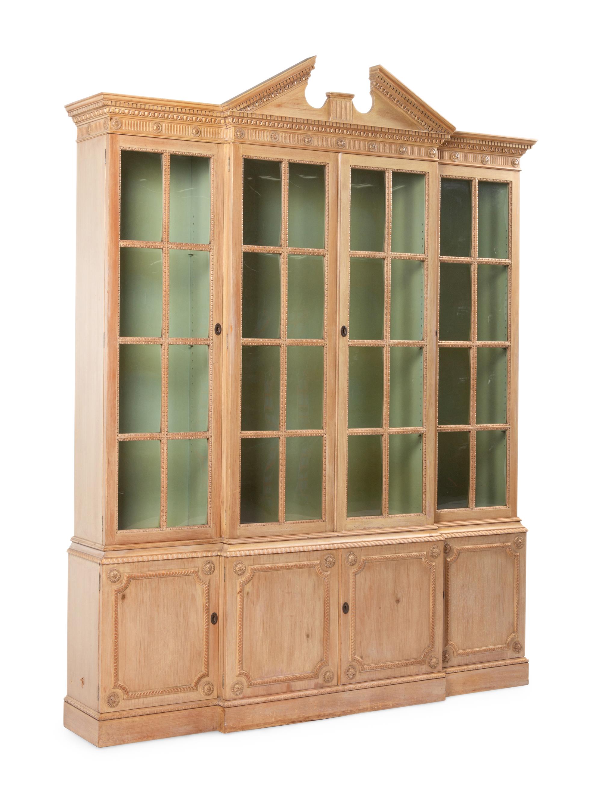 A George III Style Carved Pine Breakfront Bookcase