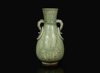 A Chinese celadon-glazed peony-incised vase, Ming to Qing dynasty 青釉刻劃牡丹瓶 明或清