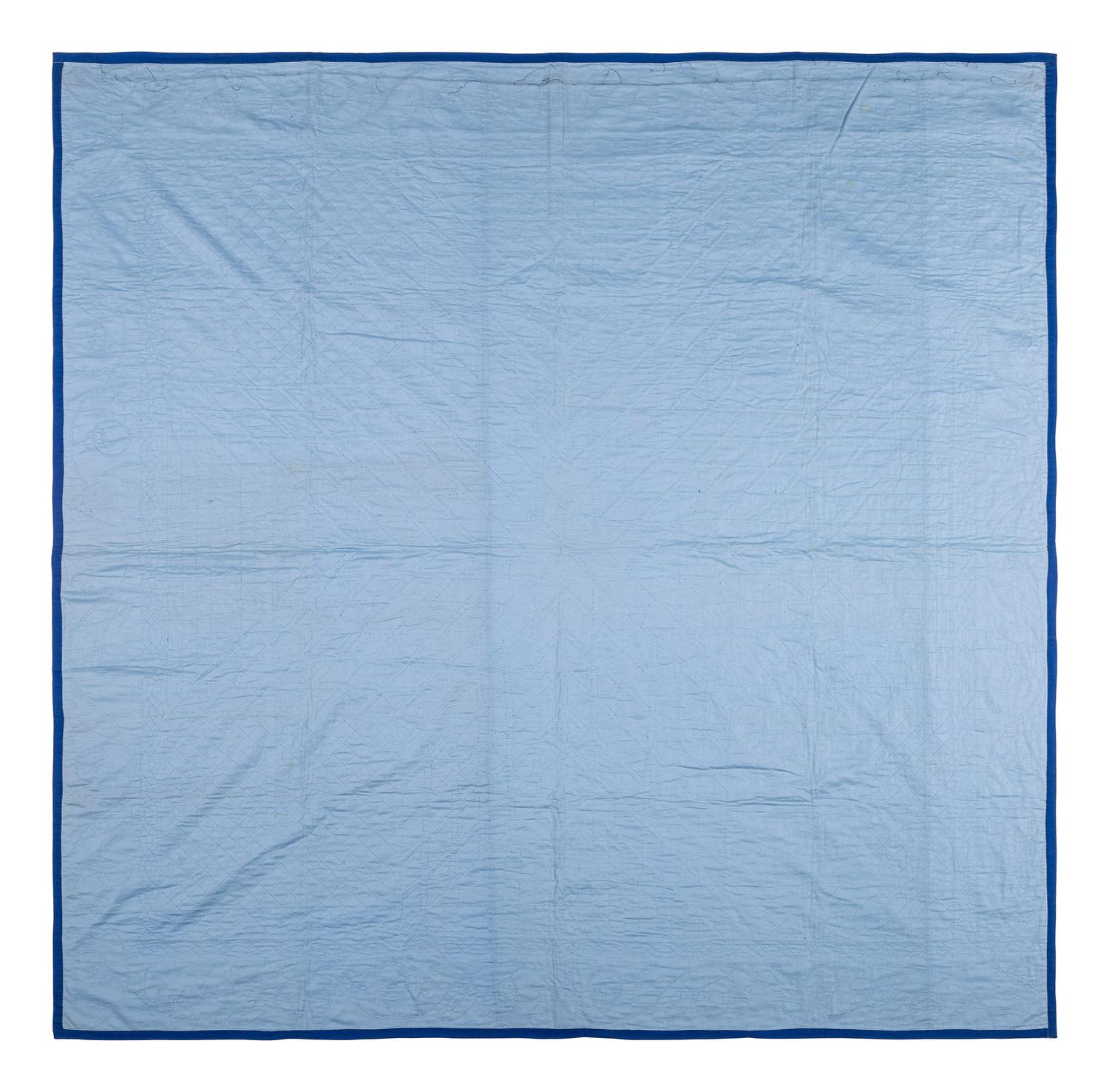 An Amish Eight Point Star Pieced Cotton and Satin Quilt