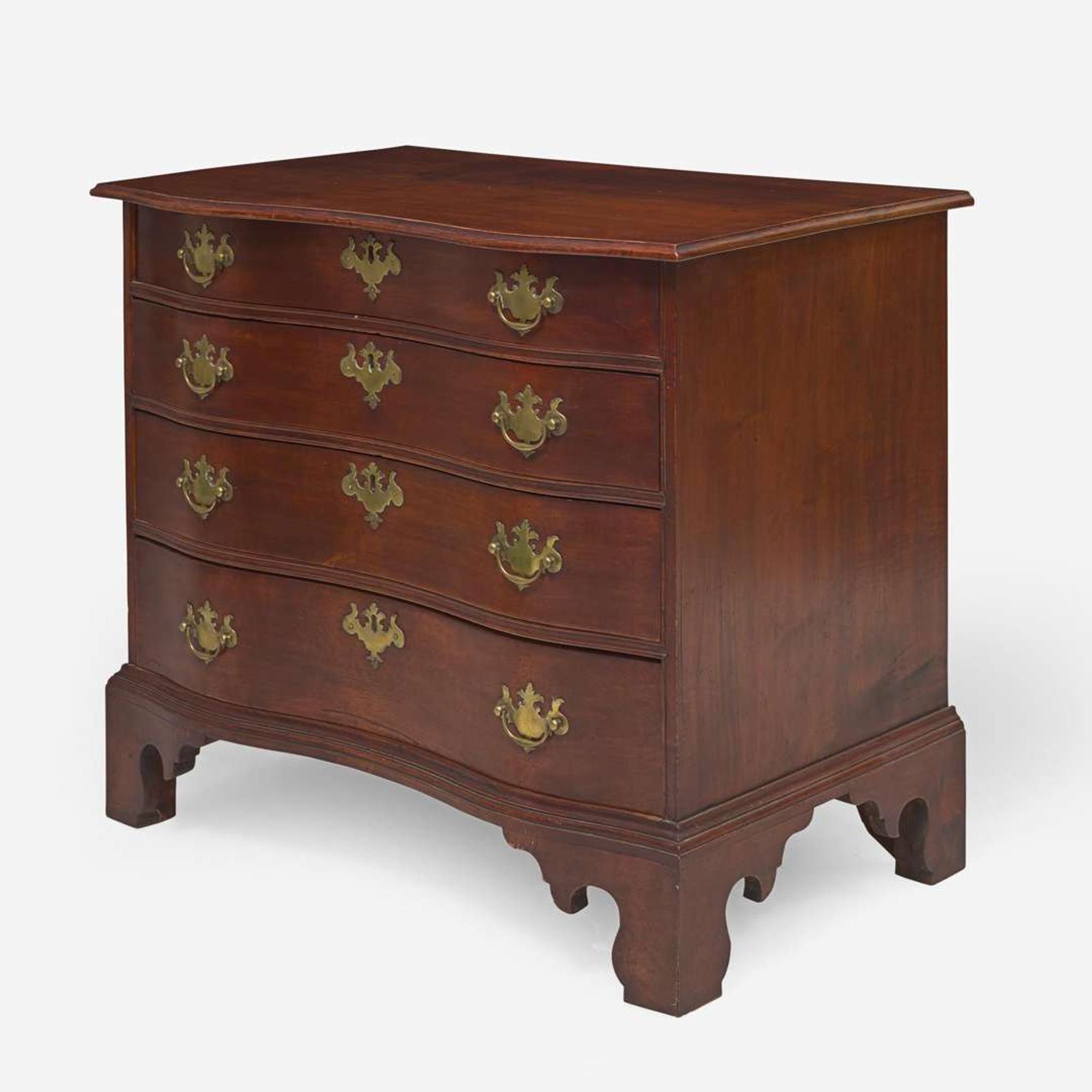 A Chippendale reverse serpentine carved maple and birch chest of drawers New England, circa 1785