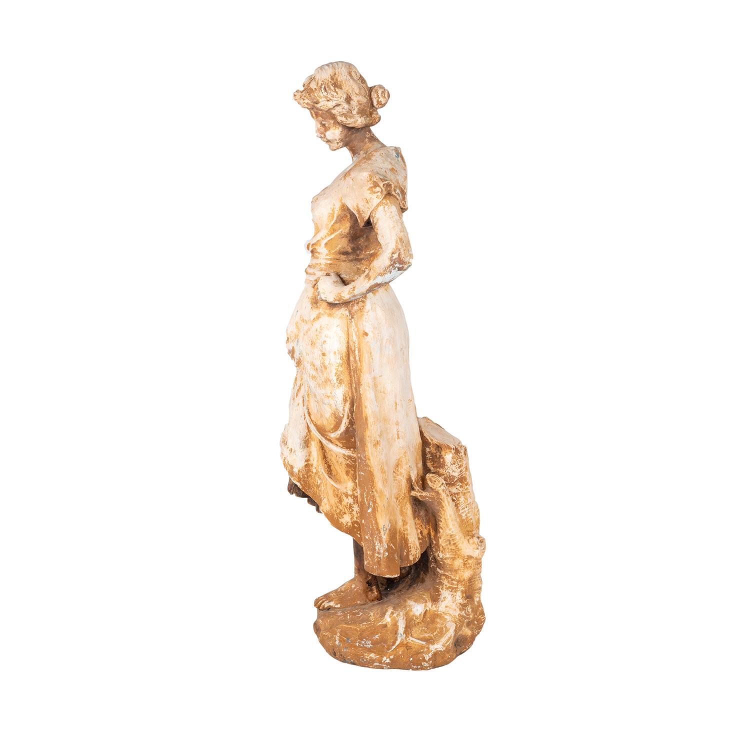 A French Terra Cotta Figure of a Farm Girl